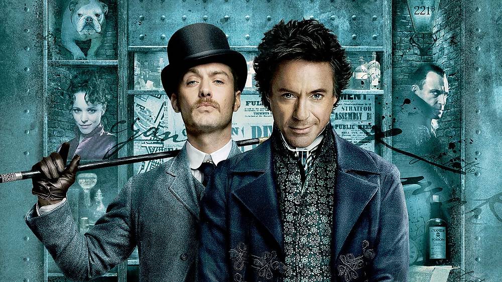 Sherlock Holmes (2009).
Nové dynamické zpracování nejznámějšího díla Sira Arthura Conana Doyla „Sherlock Holmes“ přináší Holmesovi (Robert Downey Jr.) a jeho věrnému partneru Watsonovi poslední výzvu. Ukáže se, že Holmesovy bojové schopnosti jsou stejně tak smrtící jako jeho pověstný intelekt. Obojího bude zapotřebí při odhalování smrtelného spiknutí, které by mohlo zničit celou zemi.